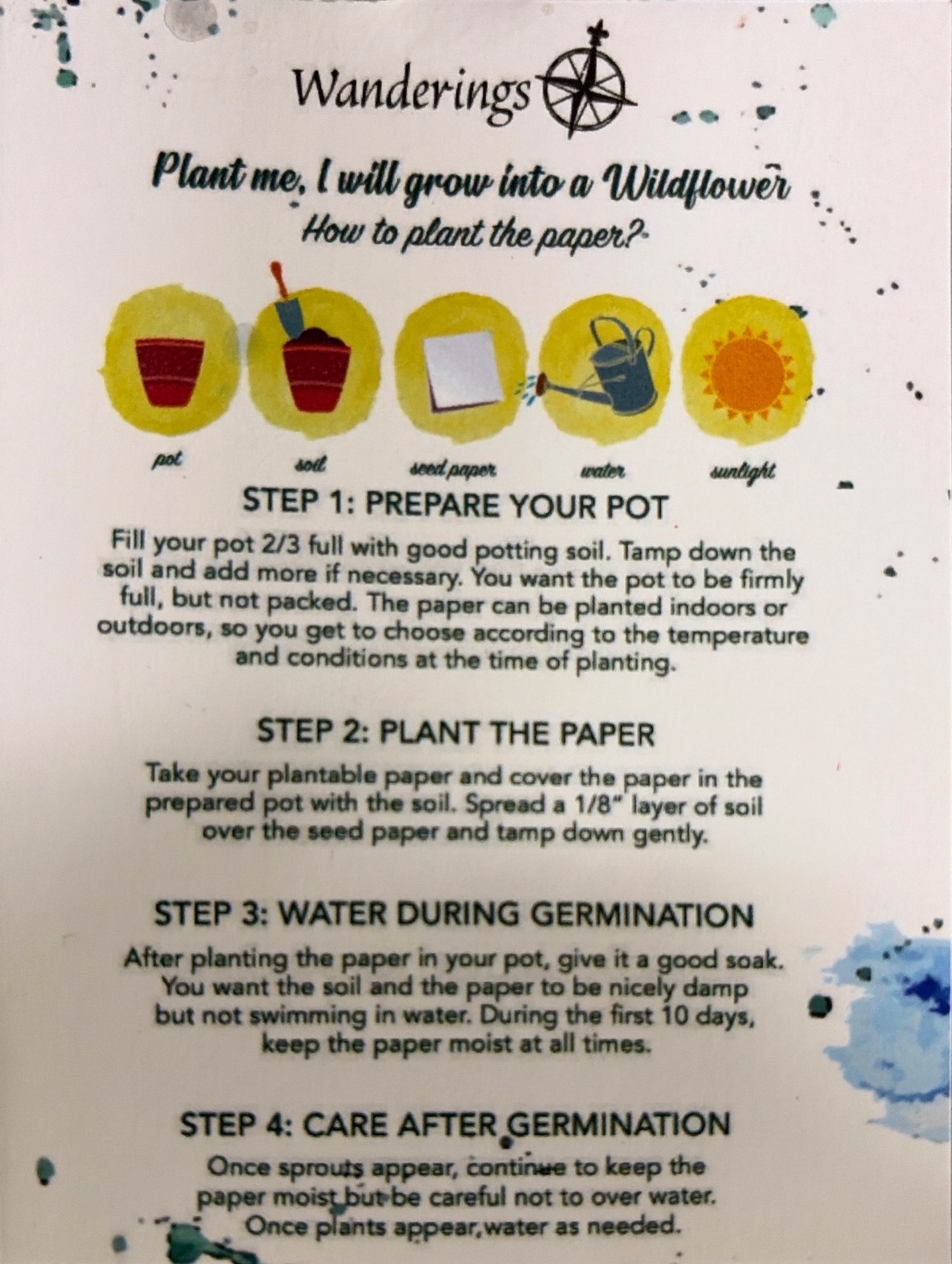 An instructional card titled "Wanderings" explaining how to plant seed paper to grow wildflowers. Five circular yellow icons display the required materials: a pot, soil with a trowel, seed paper, a watering can, and a bright sun. Below the icons, four numbered steps outline the planting process, including preparing the pot, covering the seed paper with 1/8 inch of soil, maintaining moisture during the initial 10-day germination period, and caring for the sprouts once they emerge.